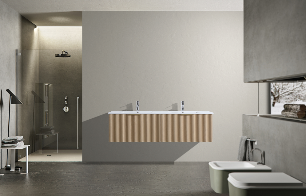 Modern bathroom with a bathtub, shower, and sink.